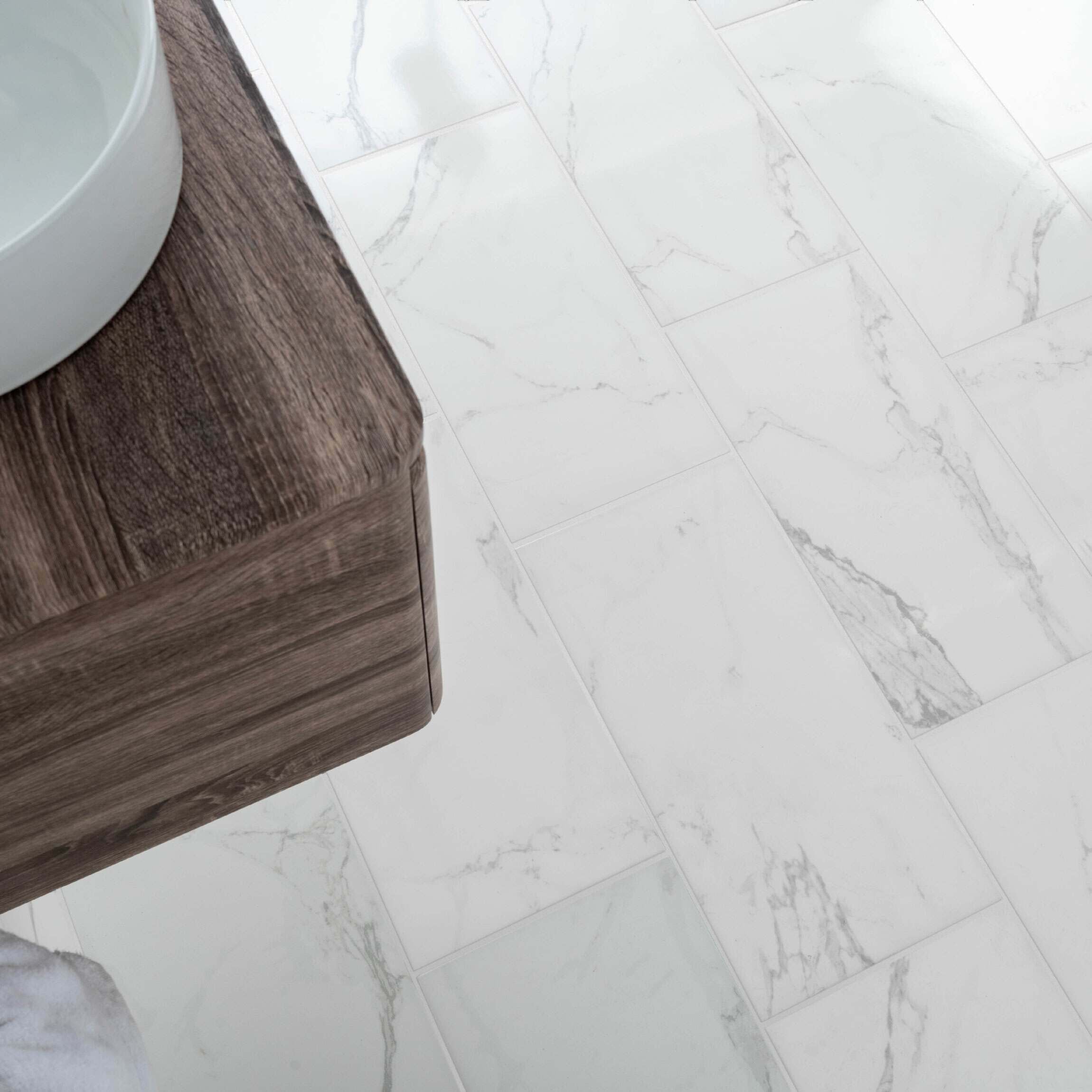 White Polished Marble Wall and Floor Tile 30x60cm https://tile.co.uk/collections/floor-tiles/products/30x60cm-statuario-mercury-polished-tile