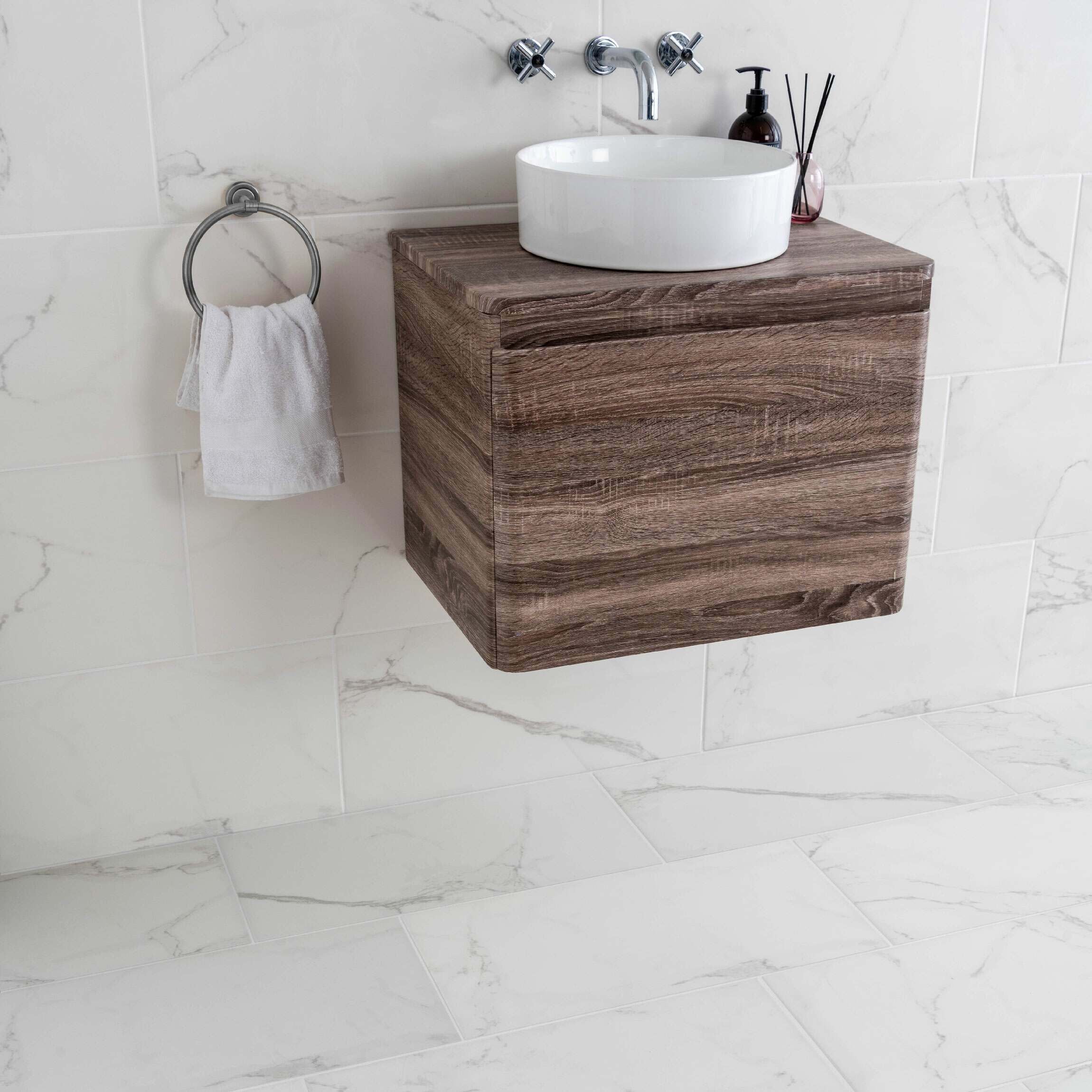 White Polished Marble Wall and Floor Tile 30x60cm https://tile.co.uk/collections/floor-tiles/products/30x60cm-statuario-mercury-polished-tile