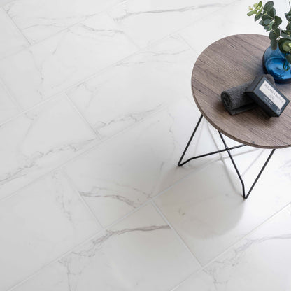 White Polished Marble Wall and Floor Tile 30x60cm https://tile.co.uk/collections/floor-tiles/products/30x60cm-statuario-mercury-polished-tile