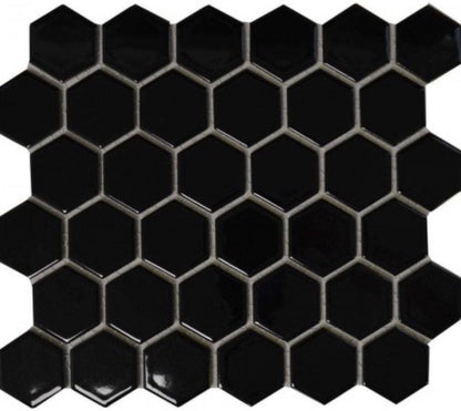 Nickel Noir Hexagon Tile (32.5 x 28.2cm) https://www.wallsandfloors.co.uk/pixel-black-hexagon-gloss-50x50-mosaic-tiles