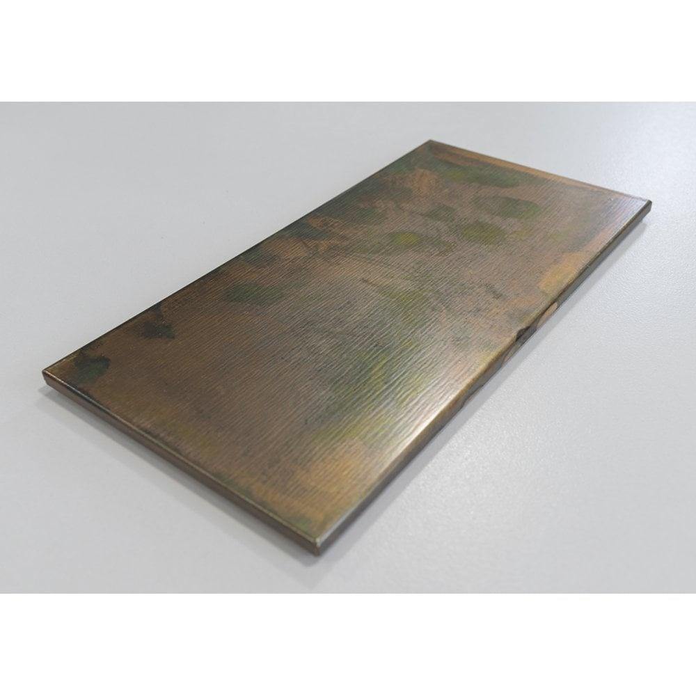 Rustic Copper Decor Metro Wall Tile (10 x 30cm) https://www.luxurytiles.co.uk/rustic-copper-decor-metro-tile-100x300mm.html