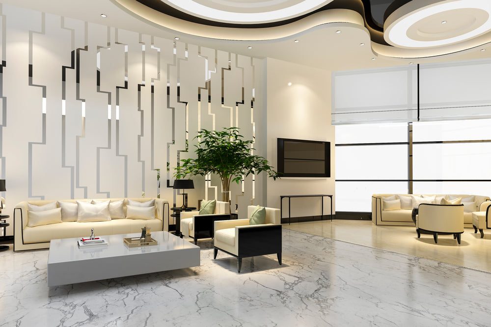 Living space with polished white marble effect floor tiles